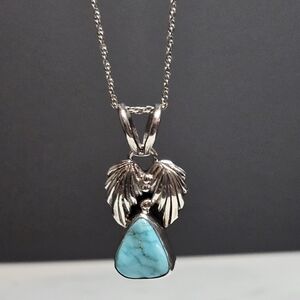 Turquoise Angel Pendant On Sterling Silver